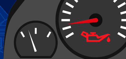 Image of a car dashboard giving an engine oil light warning