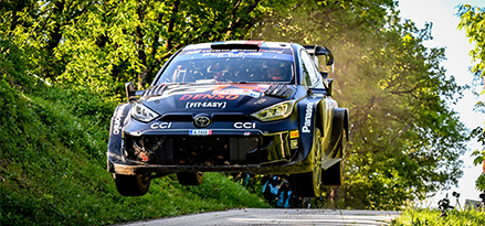 Toyota Gazoo racing car in the air above road