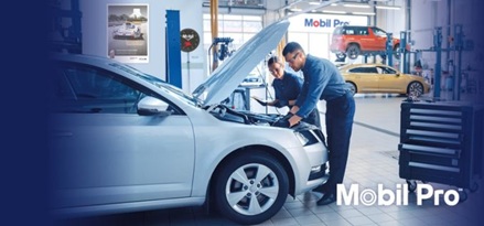 2 Mobil engineers leaning over the bonnet of a car